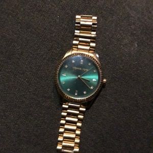 Michael Kor’s Gold Watch with Green Face